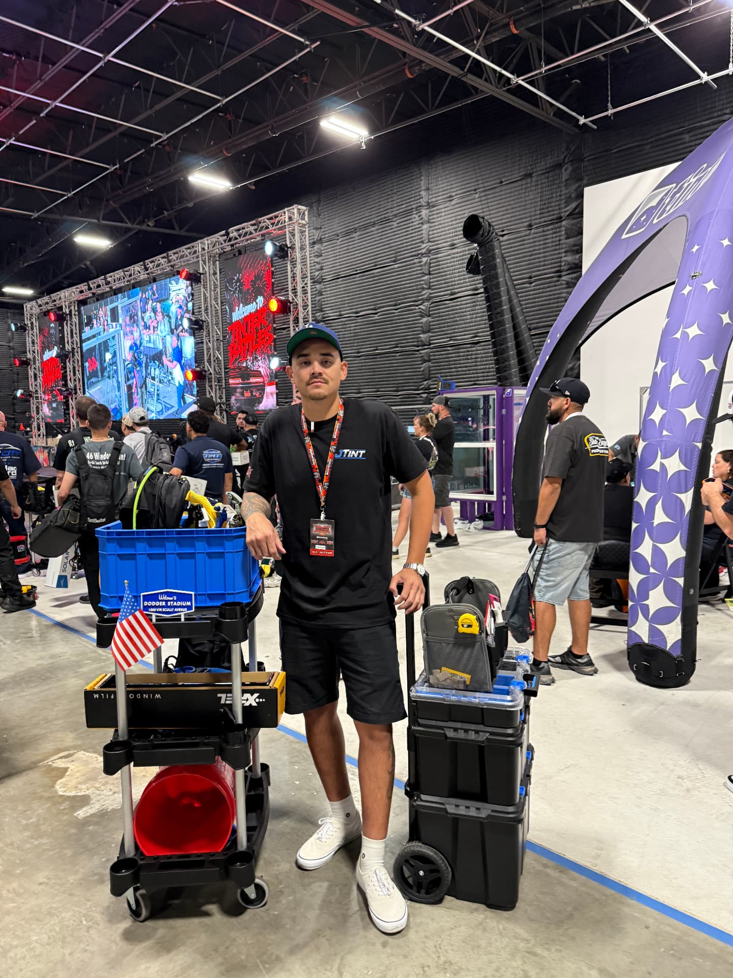 JTINT owner JT with his install cart and all-access credential at the national tint installer competition